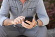 © Adam Radosavljevic - Old man typing SMS on smartphone