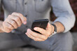 © Adam Radosavljevic - Old man typing SMS on smartphone