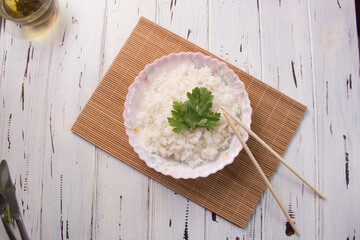 boiled rice closeup on a light background. Vegetarian food. Healthy eating