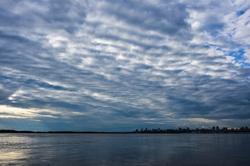 Wall Mural - clouds over the river