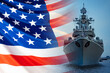 The concept is the us Navy. Front view of the battleship against the American flag. American fleet. Weapons of the American army. Participation of military vessels in conflicts at sea.