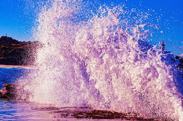 Canvas Print - Splashes of the foamy waves of the sea