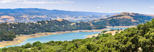 High Angle View Of Anderson Reservoir, A Man Made Lake In Morgan Hill, Managed By The Santa Clara Valley Water District, Maintained At Low Level Due To Failure Risk In Case Of Earthquake; California