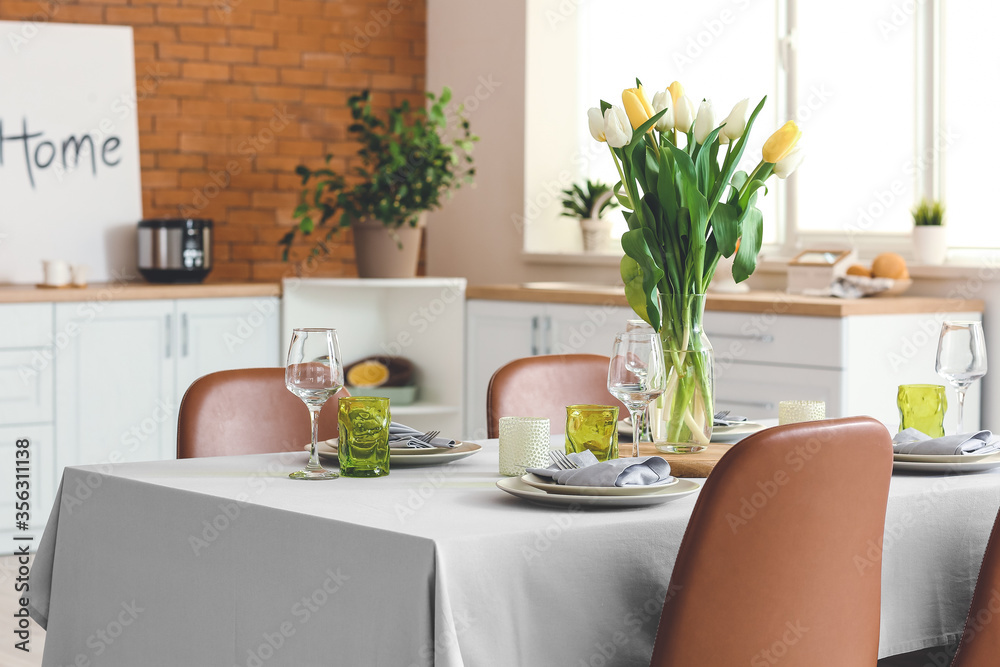 Served table in modern dining room