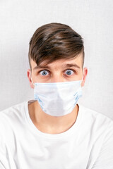 Wall Mural - Young Man with a Flu Mask