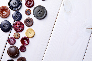 Poster - Background and texture of multicolored antique buttons