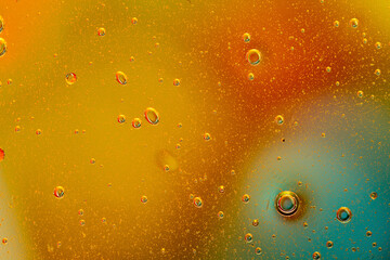 Wall Mural - Abstract colorful background with oil drops and waves on water surface