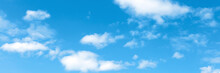 Blue Summer Sky With Cumulus White Clouds. Low Angle Shot. Banner For Website.
