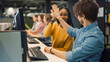© Gorodenkoff - University Library: Bright Black Girl and Smart Hispanic Boy Together Work on Computers, Give High-Five After Successfully Accomplished Task. Student Exam Study Teamwork
