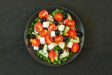 Green salad with tomato and fresh vegetables