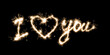 © Eno1 - The inscription I love you on a black with sparklers using a simulated long exposure.