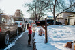 © Cavan Images - young girl putting letter in mail box