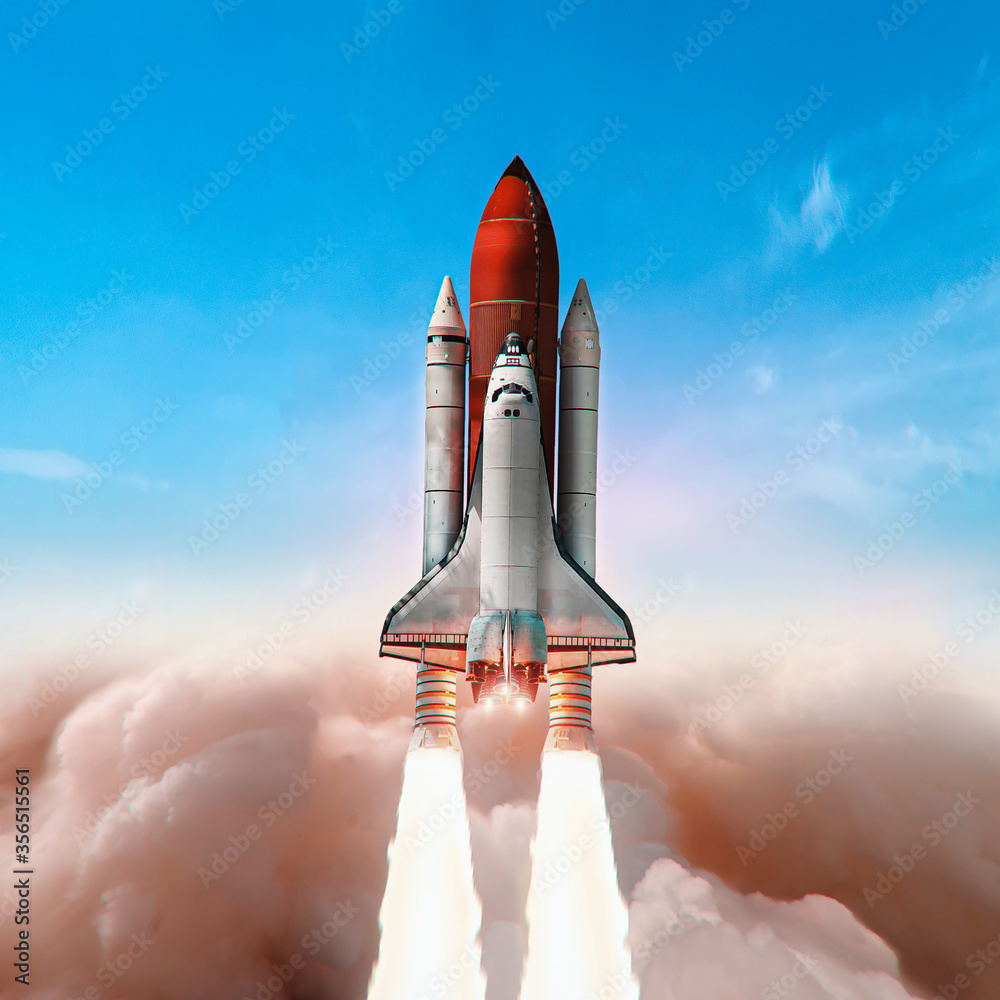 Space shuttle mission launch from Earth to the space. Clear blue sky ...