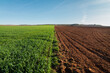 © Juan Lopez/ADDICTIVE STOCK - Rural landscape with agricultural field half plowed and half planted under blue sky in sunny day in countryside