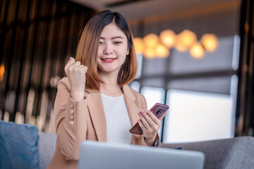 Team work process. Two women with laptop in open space office. Business concept., two women is meeting for business matching. ,Two young beautiful asian business woman in the conversation.