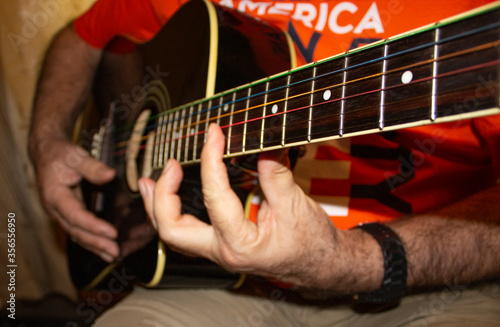 Cuadros en Lienzo The fretboard of an old acoustic guitar