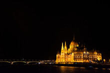 View Landscape And Cityscape Of Old Town City And Hungarian Parliament With Danube Delta River And Buda Chain Bridge In Night Time In Budapest, Hungary