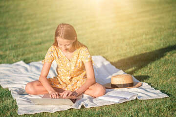 Little smiling girl playing in the park