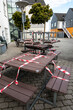 © Alexander - Aarhus, Denmark Picnic tables in old town cordoned off for Coronavirus.