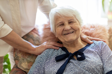 Wall Mural - Woman spending time with her elderly mother

