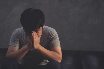 young man with headache