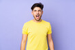 © luismolinero - Arabian handsome man over isolated background shouting to the front with mouth wide open