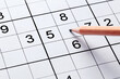 Close up sudoku puzzle game and pencil