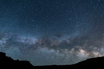 Wall Mural - beautiful starry sky with bright milky way galaxy. night landscape. astronomical background.