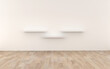 3D rendered empty room with white wall and three shelves on the wall. Room has wooden floor.