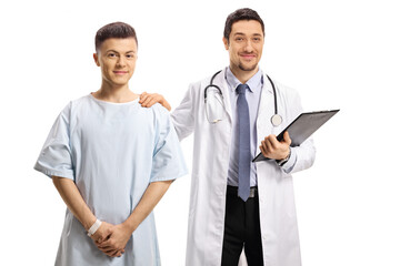 Male doctor holding a young male patient on the shoulder