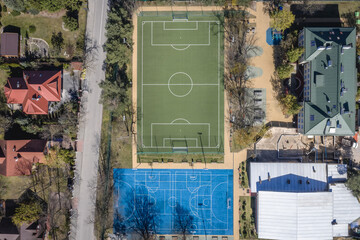 Poster - Drone view of football field in Choszczowka area of Warsaw, capital city of Poland