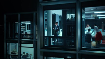 Poster - Footage from Outside: Businessman Working on a Digital Tablet Computer in the Office. Manager Checking Emails while Standing by the Window. Employee Planning Financial Tasks and Business Development.
