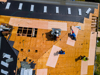 Demolition removal of an old asphalt shingle roof that was installed new shingle roof