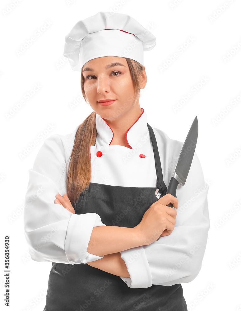 Young female chef with knife on white background