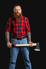 Poster - Handsome lumberjack on dark background