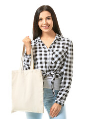 Wall Mural - Young woman with eco bag on white background