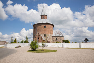 Wall Mural - Round church with blue sky and clouds