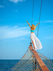 Wall Mural - Woman on a sailing ship