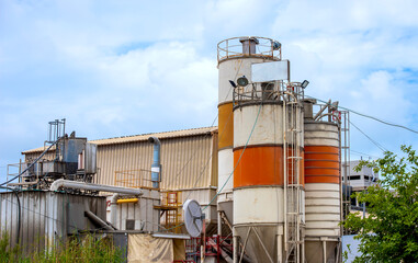 metal tanks at a chemical plant in an industrial zone