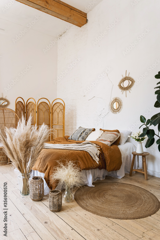 Obraz na płótnie Comfort bedroom in boho style interior with lovely furnishing w salonie