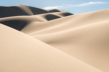 the wave and curve of the sand dunes