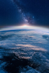 Wall Mural - view of stars and milkyway above earth from space. beautiful space view of the earth with cloud form