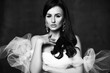 © Dmitry Lobanov - Black and white portrait of young beautiful brunette woman in white dress with transparent cloth decoration veil fata
