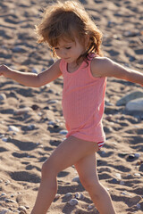 a little girl on the sand