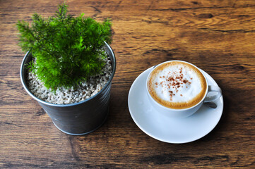 Wall Mural - Coffee cup in coffee shop