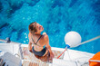 © Max Topchii - Beautiful Girl relaxing On Yacht in Greece