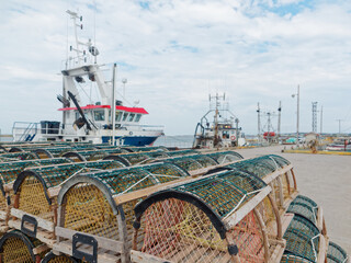 Lobster traps and fishing boats at Grande-Entrée pier, Magdalen Islands