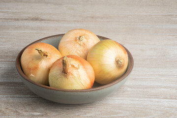 Whole Sweet Onions In A Bowl