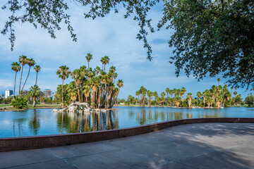 Wall Mural - An urban lake with palm trees; Encanto Park in Phoenix, Arizona.