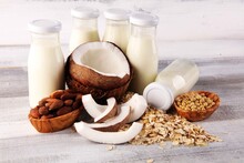 Various Vegan Plant Based Milk Alternatives And Ingredients. Dairy Free Milk Substitute Drink, Healthy Eating And Drinking